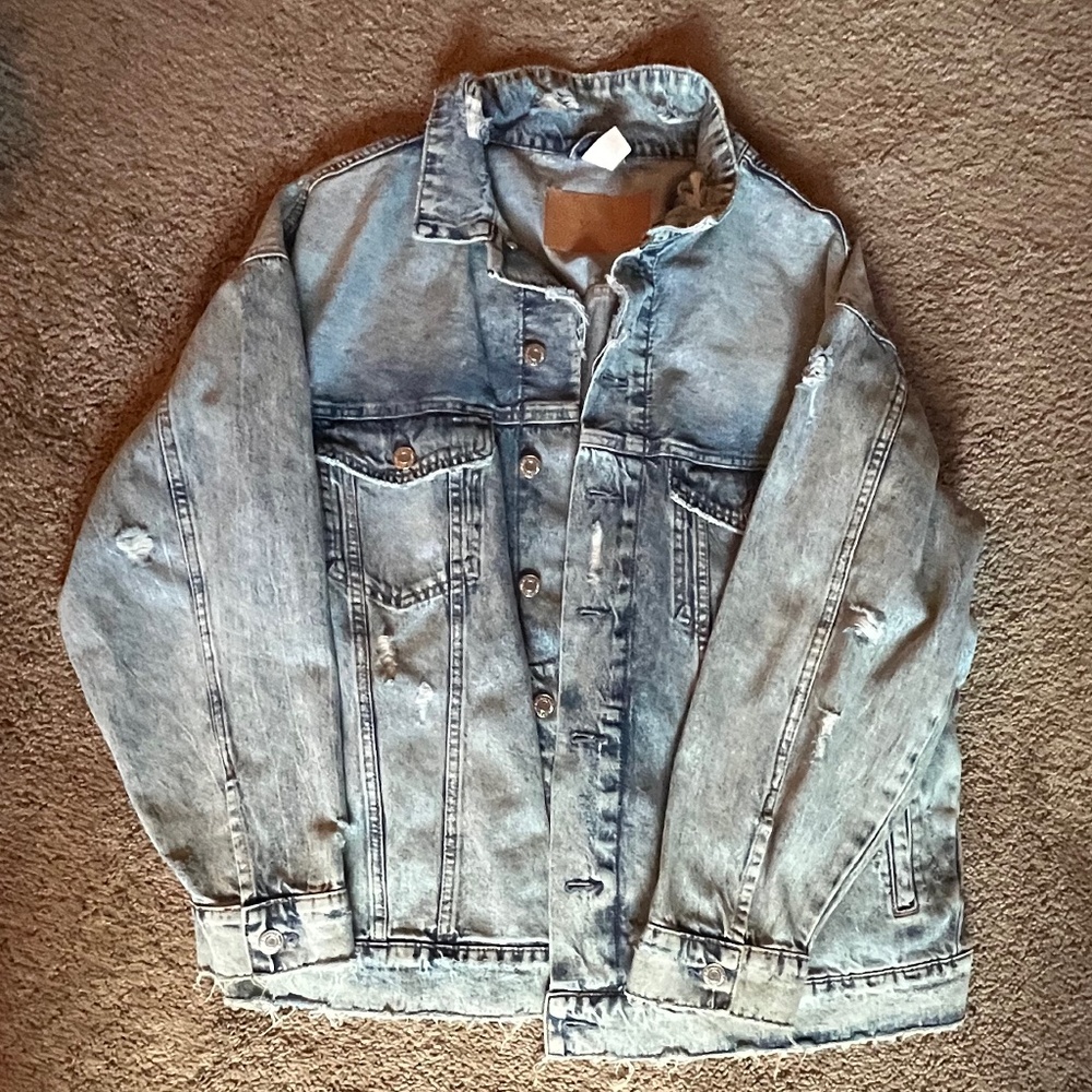 Distressed denim jacket